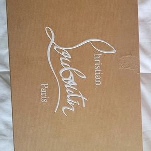 Christian Louboutin with shoe bags